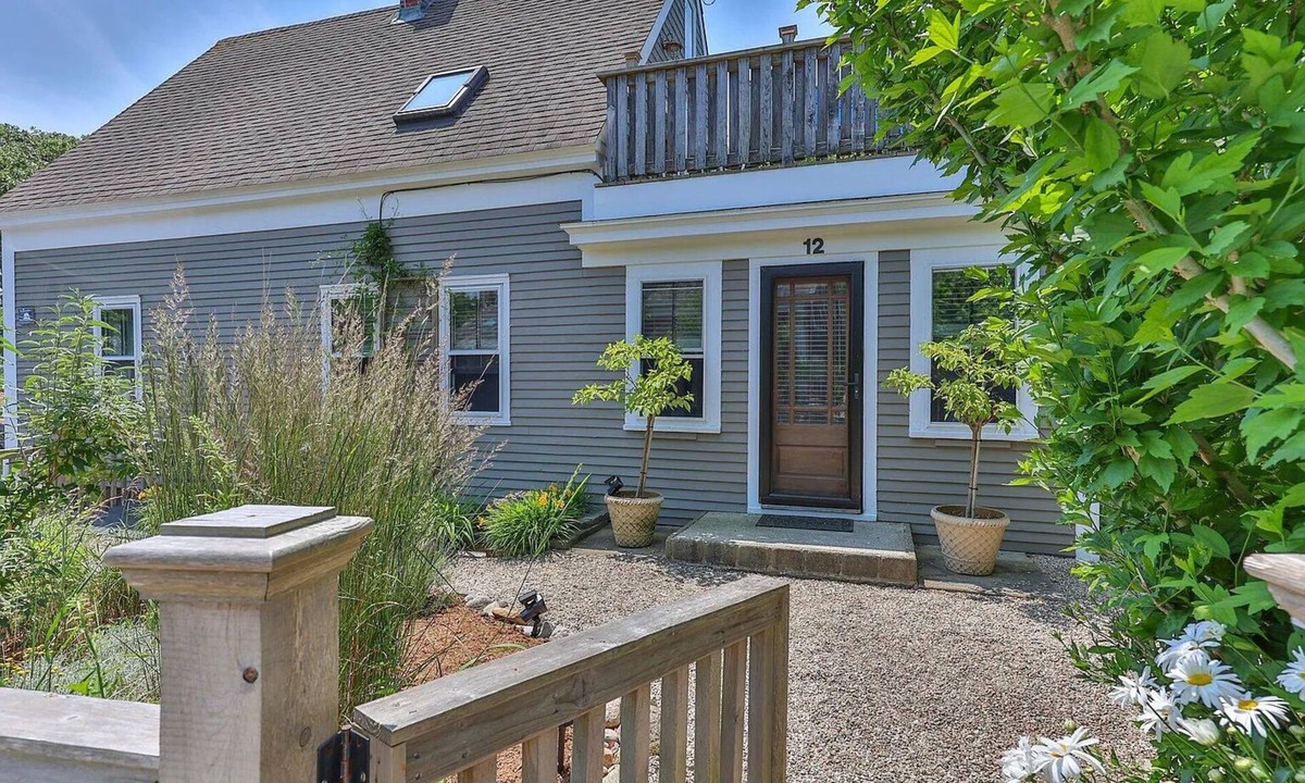 Commercial Street House | Charming West End home with brand new bathrooms and secluded patio