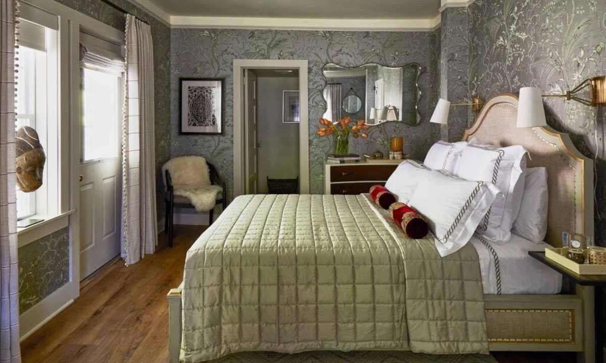 Lenox Bed & Breakfast | Elegant Carriage House room with a queen bed and private patio.
