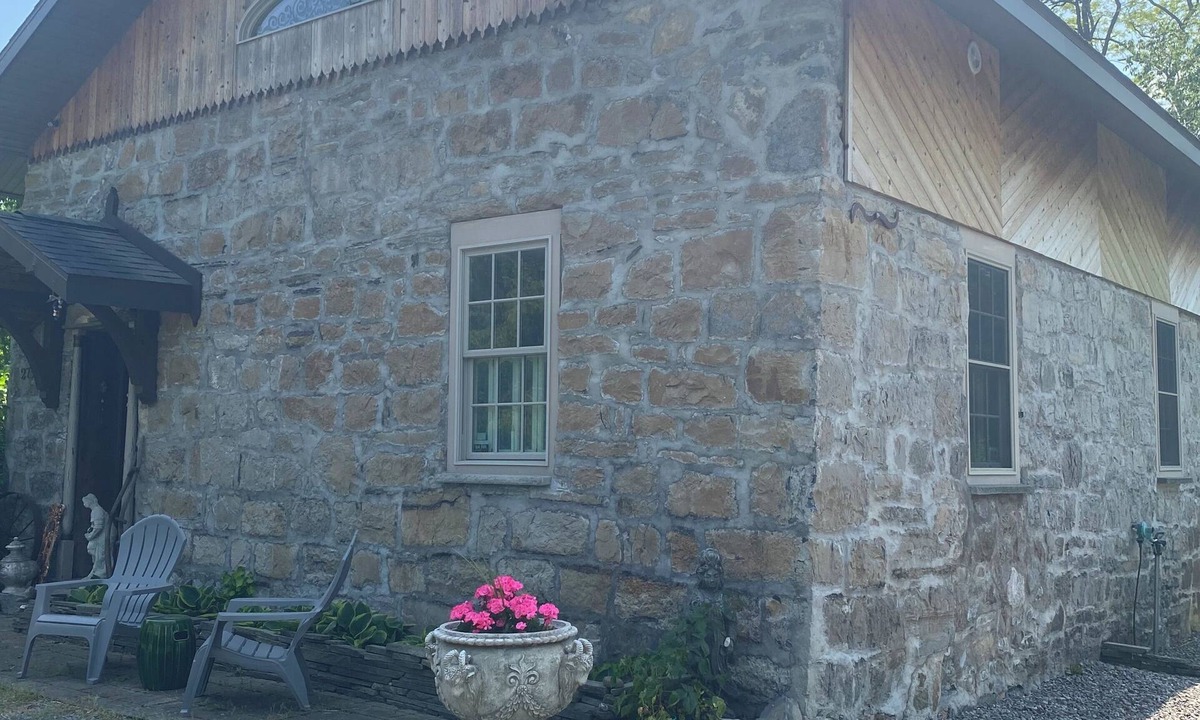 Skaneateles Cottage | English Cottage Style Circa 1814 Stone Schoolhouse