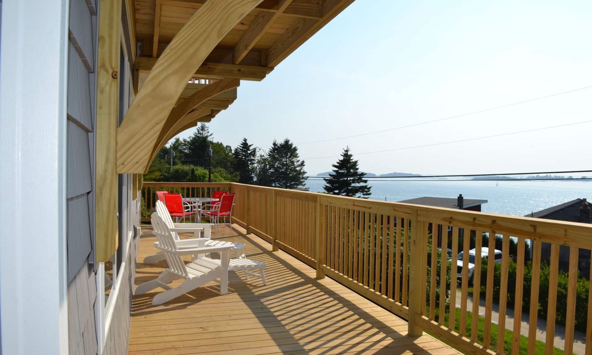 Mid-Coast and Islands House | Enjoy spectacular sunset and water views from the deck and balconies with water access.
