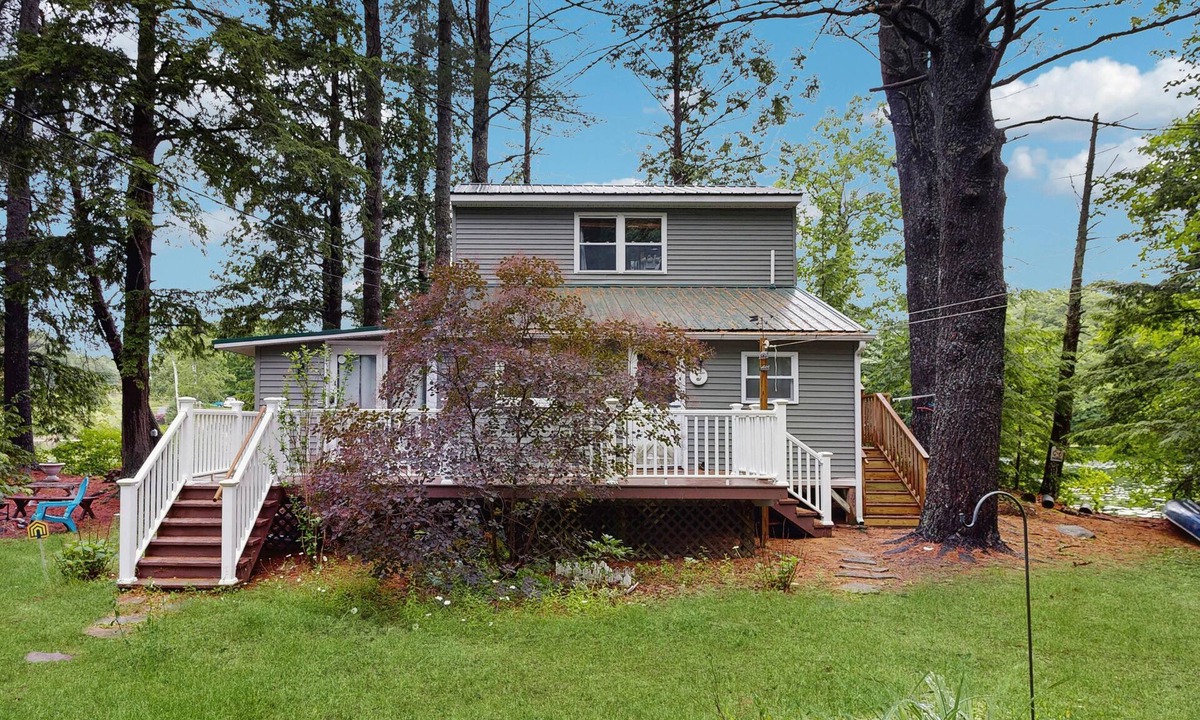 Augusta Cabin | Entire lakefront home on Togus Pond with decks, canoe, firepit & great view