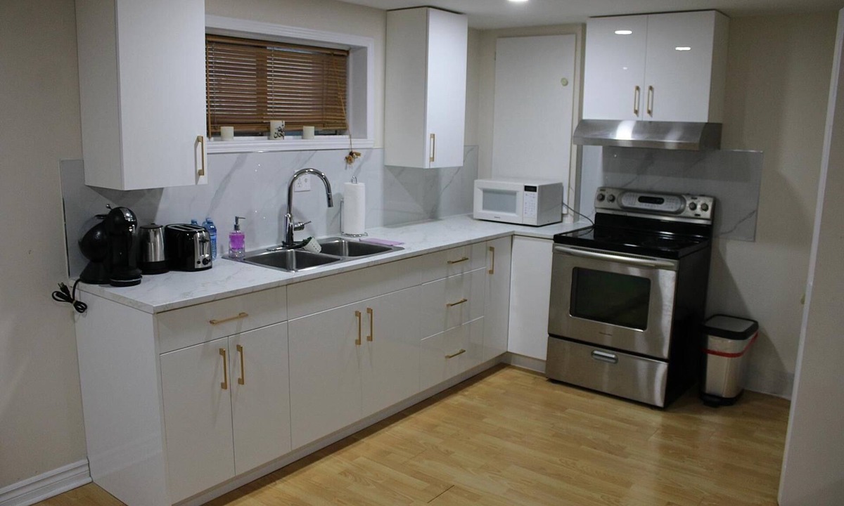 Sainte-Dorothee House | Full furnished basement 1 bedroom in unit laundry basement available in laval