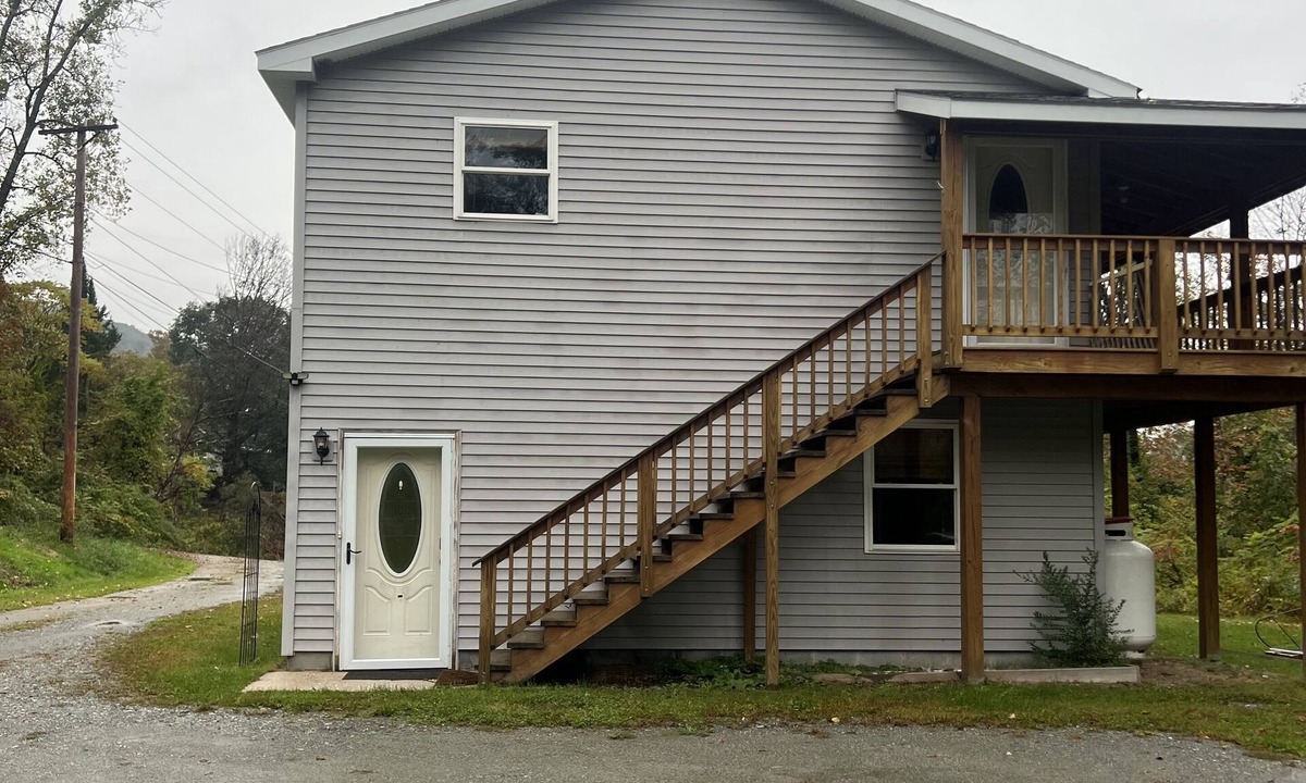 North Pownal House | Full two story home with wrap around deck and fire pit!