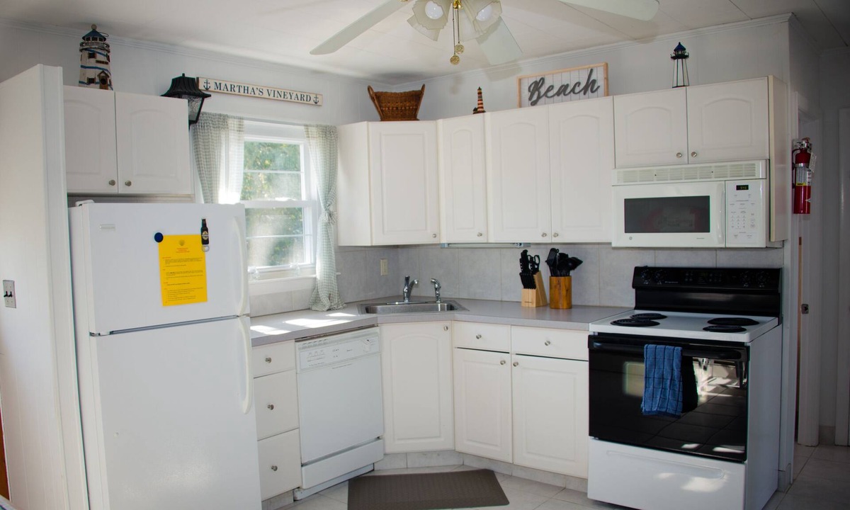 Tisbury Condo | Heart of VH, walk to ferry, shops & restaurants. Pool, AC & beach gear provided!