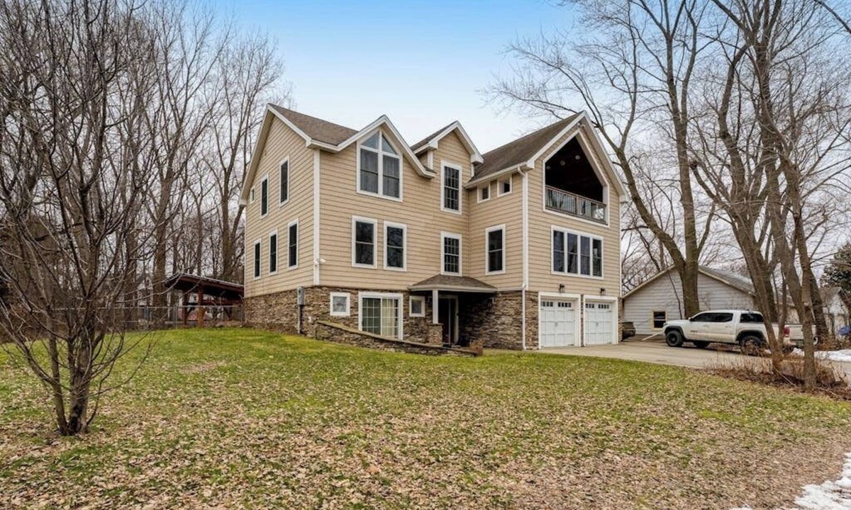Malletts Bay House | Home on Lake Champlain with pool, hot tub, in-home gym, firepit, & lovely views