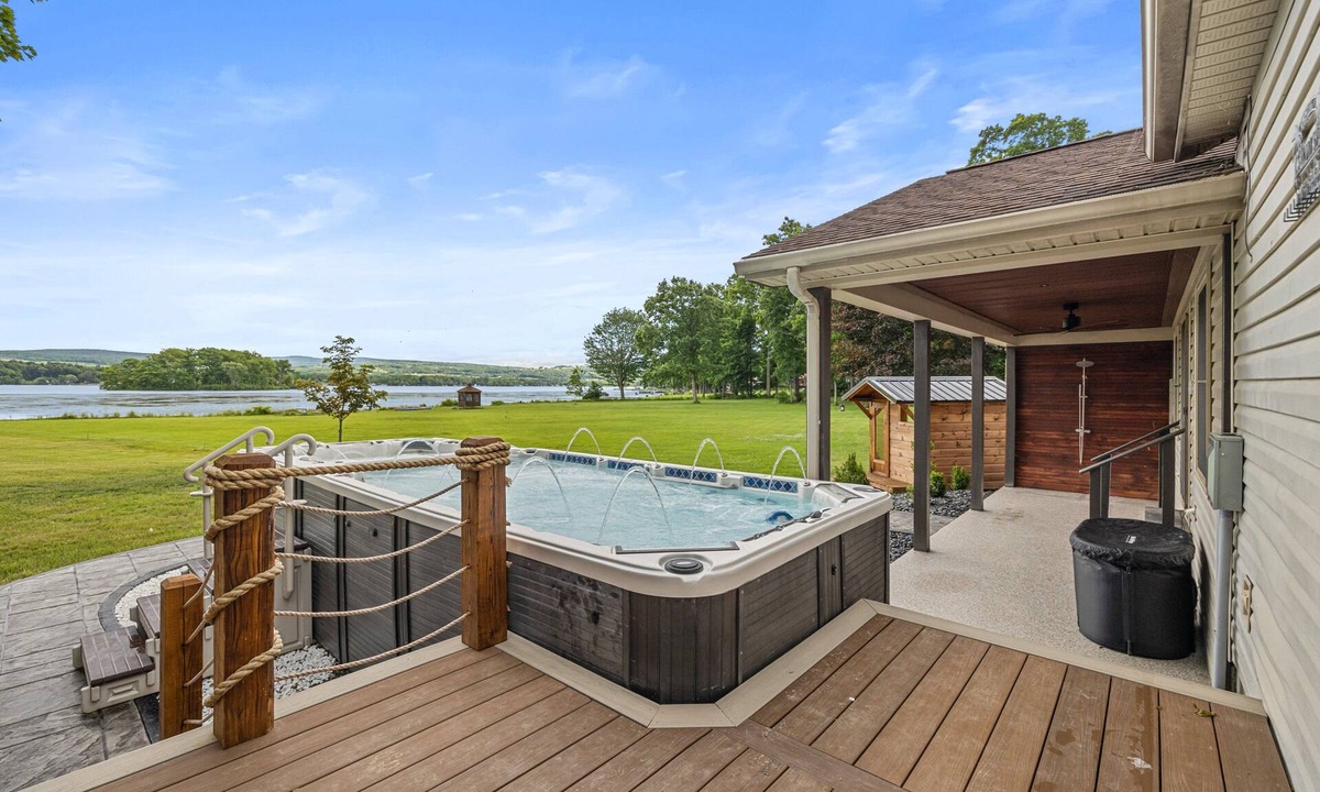 Bradford House | Island View Cottage: Lamoka lake home with pickleball court, hot tub, sauna, and game room