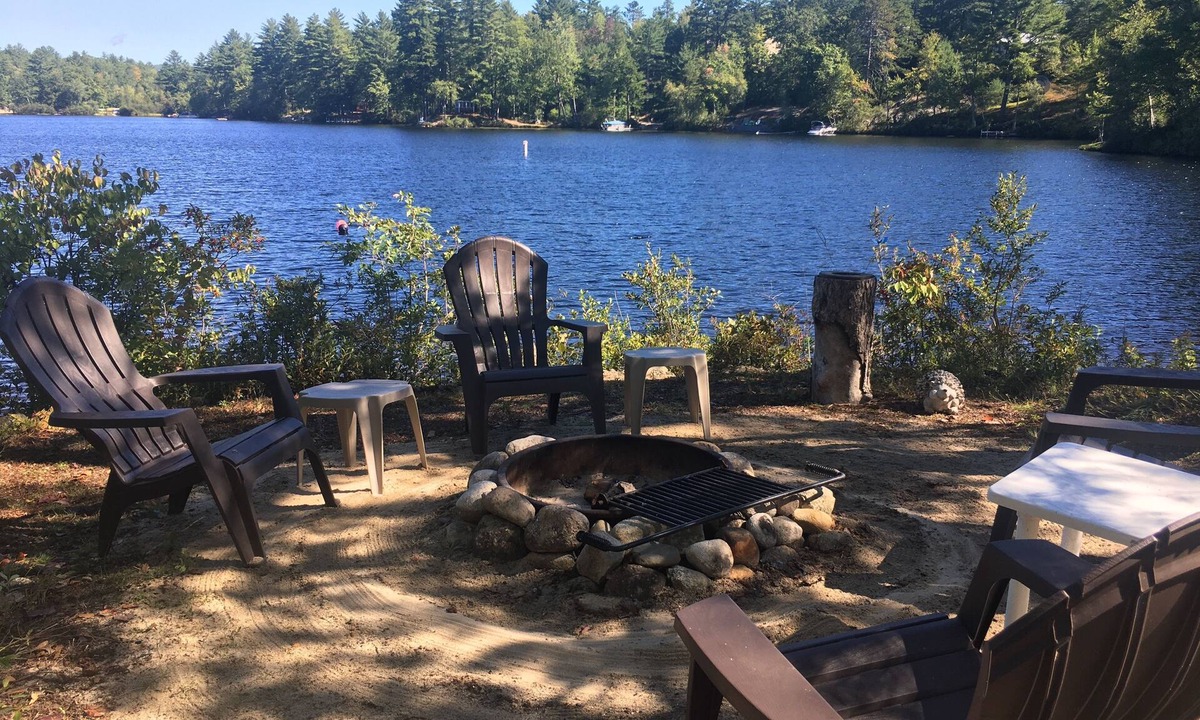 Freedom Cabin | Lake Ossipee New Hampshire waterfront cabin with beach, dock, fire pit, privacy.