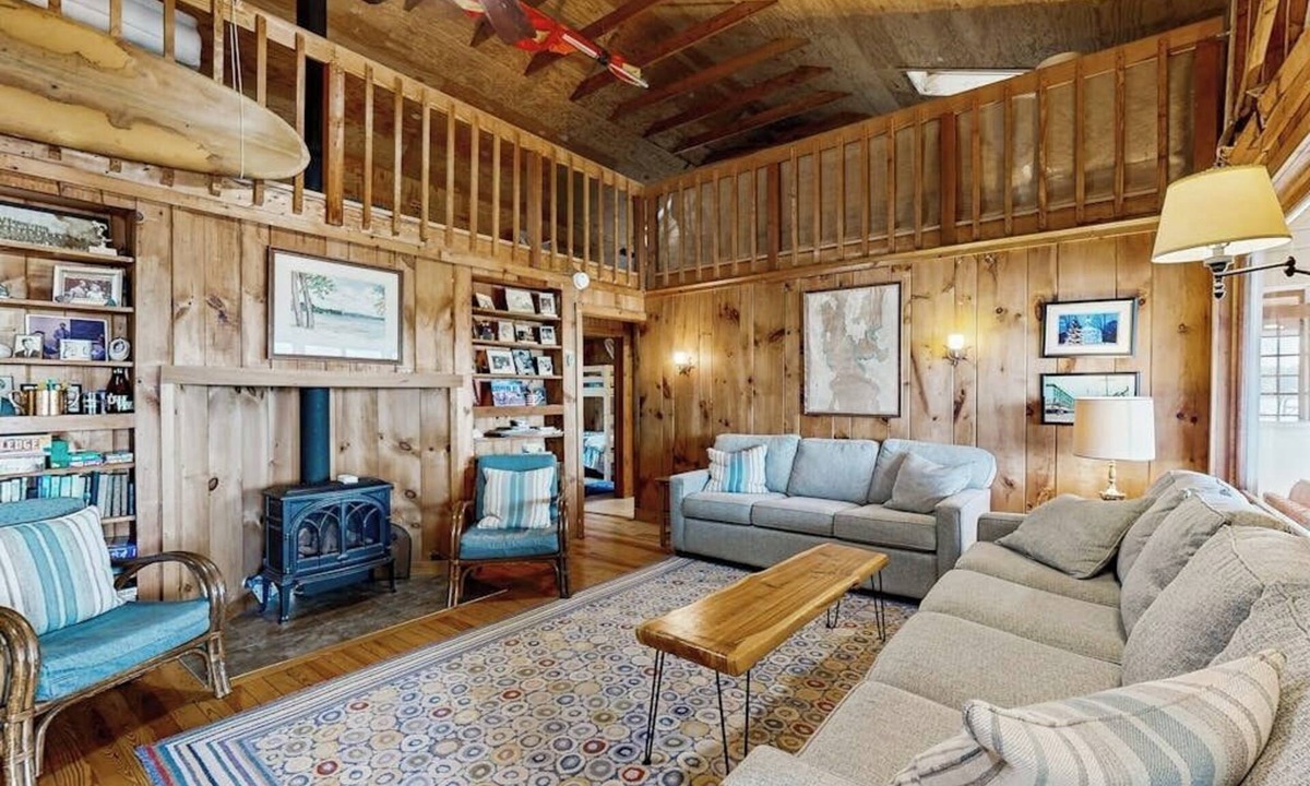 Malletts Bay House | Lakeside cottage w/mountain views, canoes, firepit, enclosed porch, bbq, beach