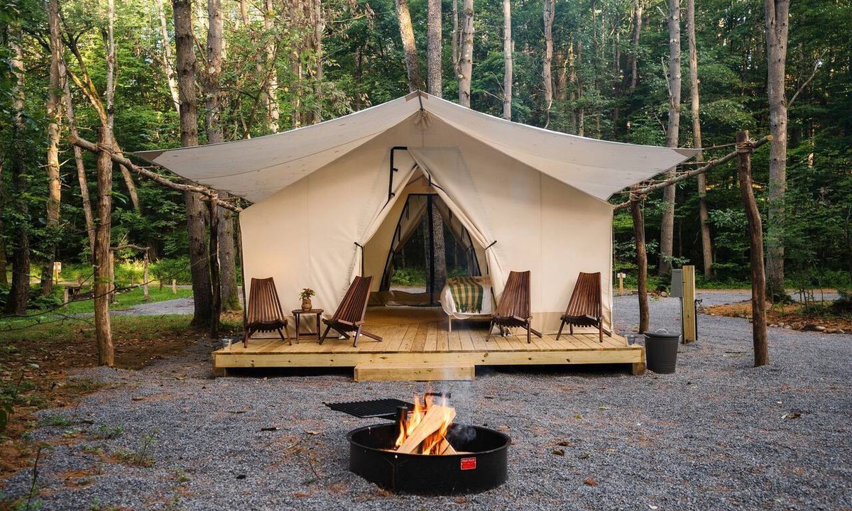 Corinth RV Rental | Luxury Group Safari Tent Complete with Firepit and Patio, Perfect for a Weekend Escape to the Adirondacks