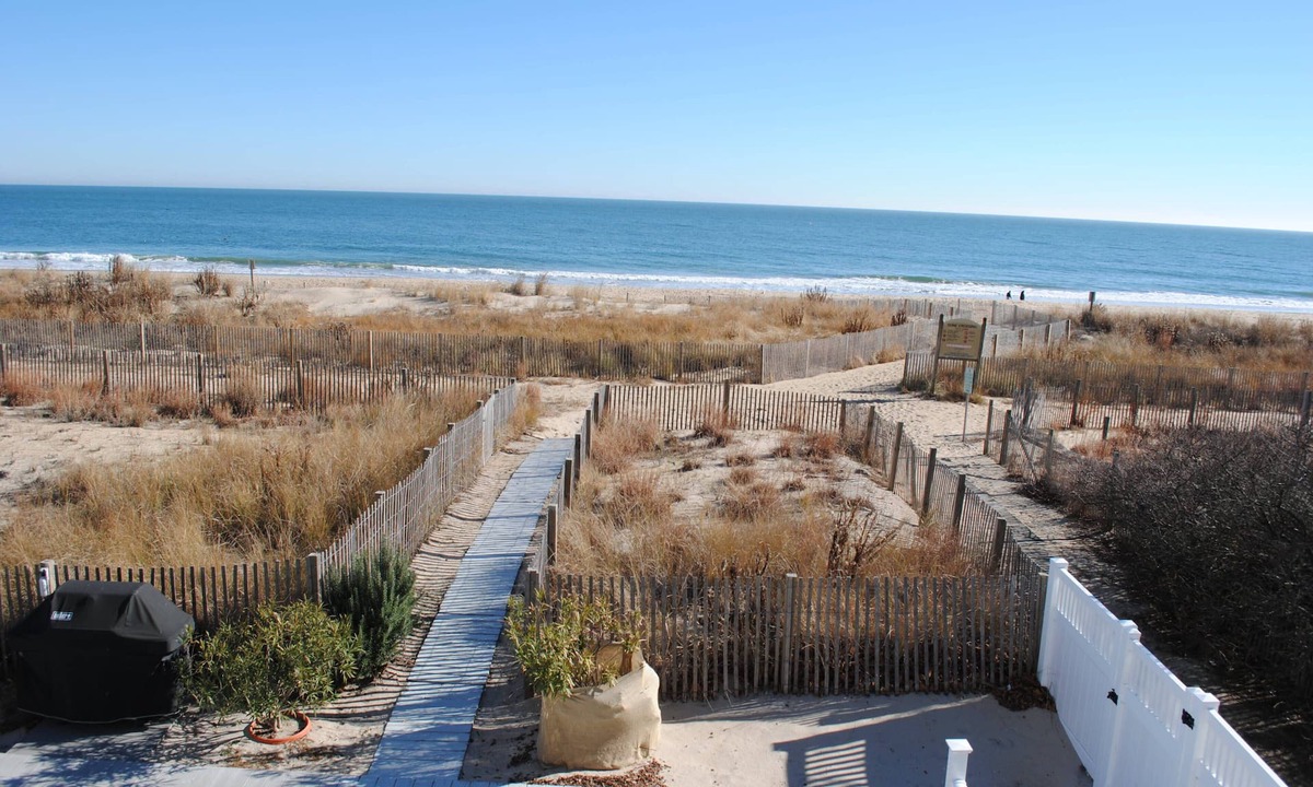 North Ocean City House | Modern, stylish 4 bedroom oceanfront end-unit townhouse with free WiFi, outdoor pool, playground, and downstairs apartment with gorgeous ocean view and only steps from beach!