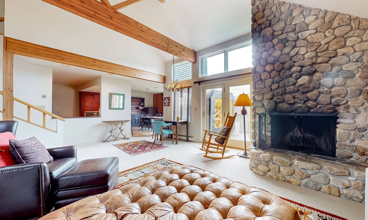 Stratton Mountain Condo | Mountain-view resort home with wood fireplace, private hot tub, grill, & deck
