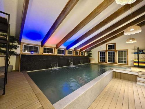 West Dover Villa | Myrtle Villa 7BR Near Mount Snow with Indoor Heated Endless Style Pool Outdoor Hot Tub