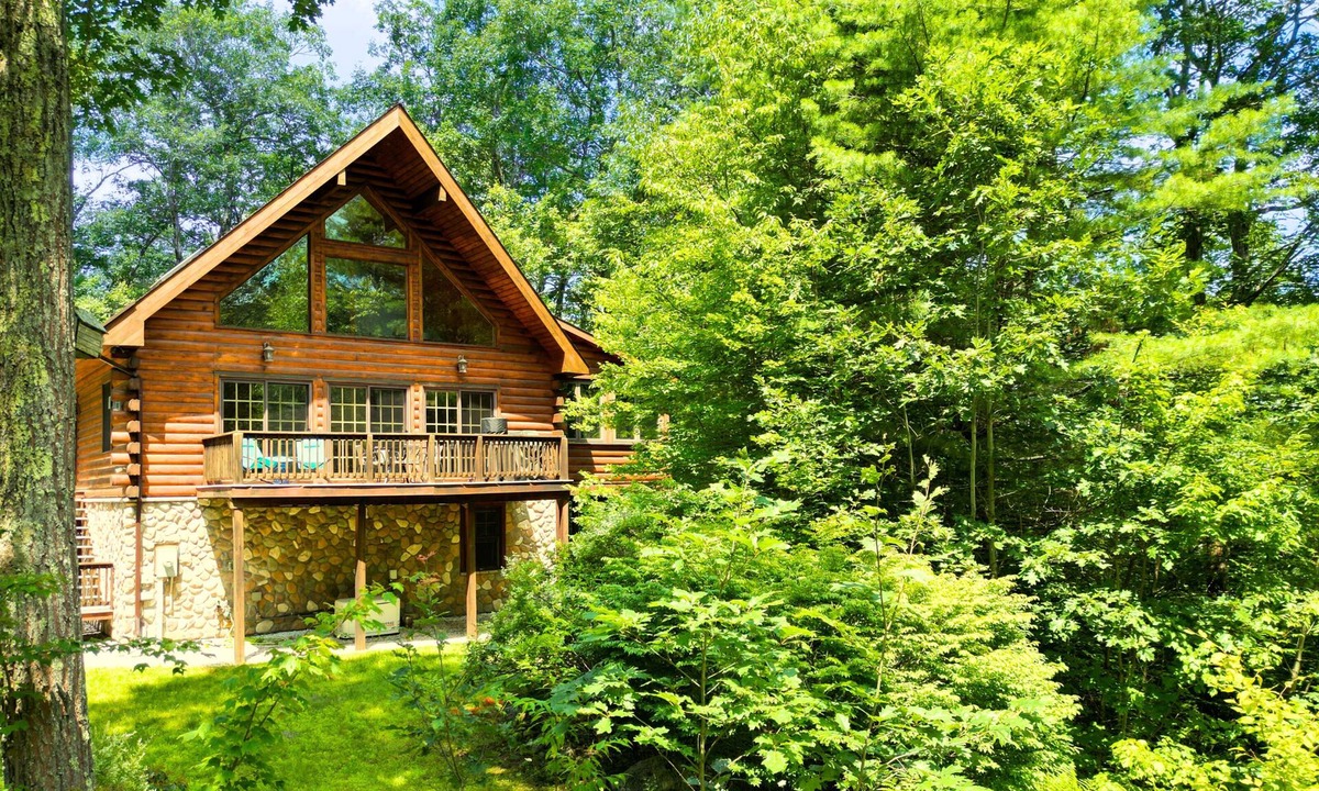 Otis Ski Chalet | Private, family-friendly 5-bedroom chalet for 10 with sauna, lake access, firepit, pizza oven, games, fast Wi-Fi, office and EV charger