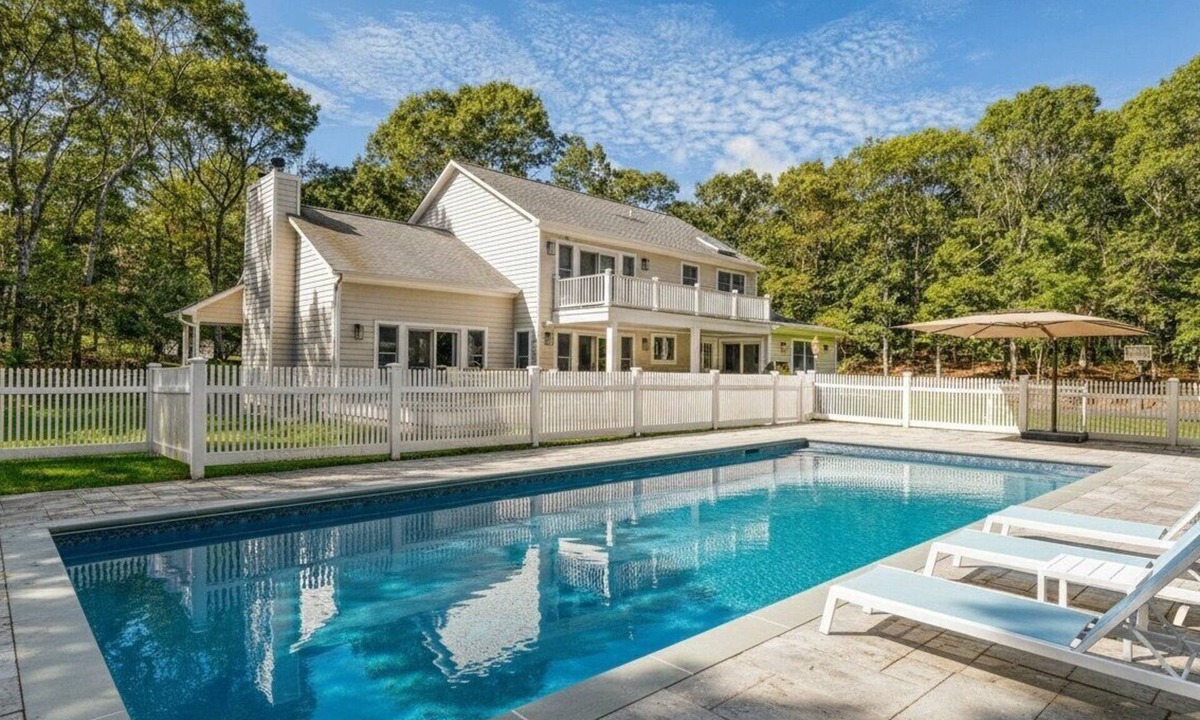 Tuckahoe House | Resort-style Southampton retreat with heated pool, chic interiors, and.