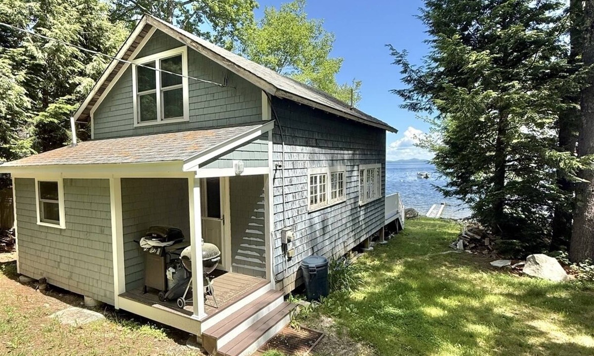 Standish Cottage | Rustic shorefront cottage with a small sandy beach