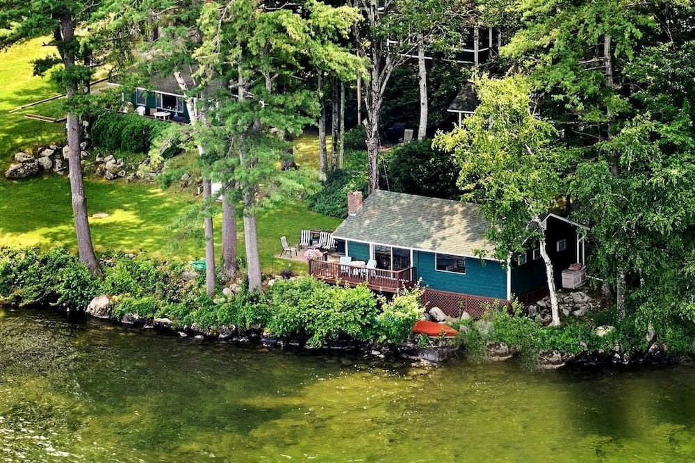 Laconia Cabin | Scenic Lakeside Cabin with Exclusive Boat Dock Near Weirs Beach, Laconia, New Hampshire