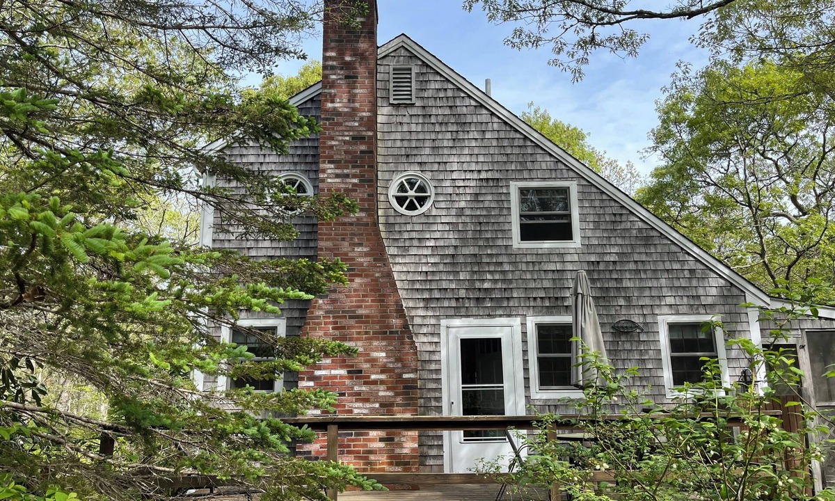 West Tisbury House | serene wooded 3-bedroom house West Tisbury deck, screen porch and outdoor shower