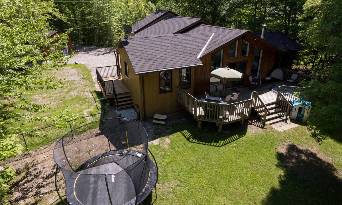 Haliburton Cottage | Serenity Now! Beautiful Drag Lake. Beach, dock, hot tub and fire pit. Flat lot.