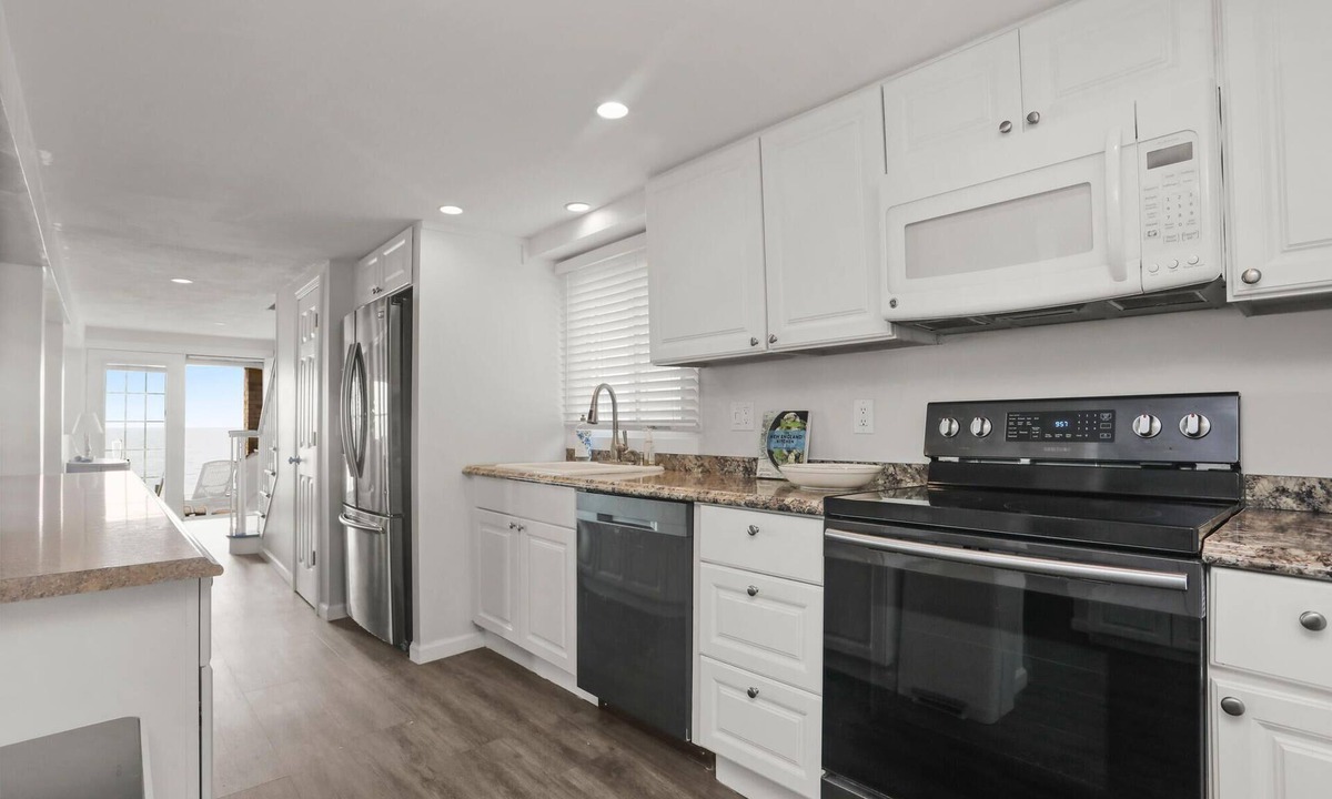 Devon House | Spacious Beachfront home in vibrant Beach Community!