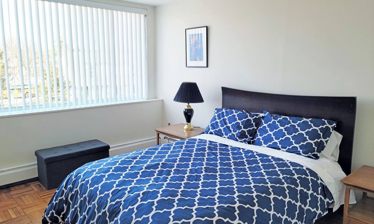 Queens Apartment | Sunny 1-bedroom apartment in Bayside, close to restaurants, shops, and train.
