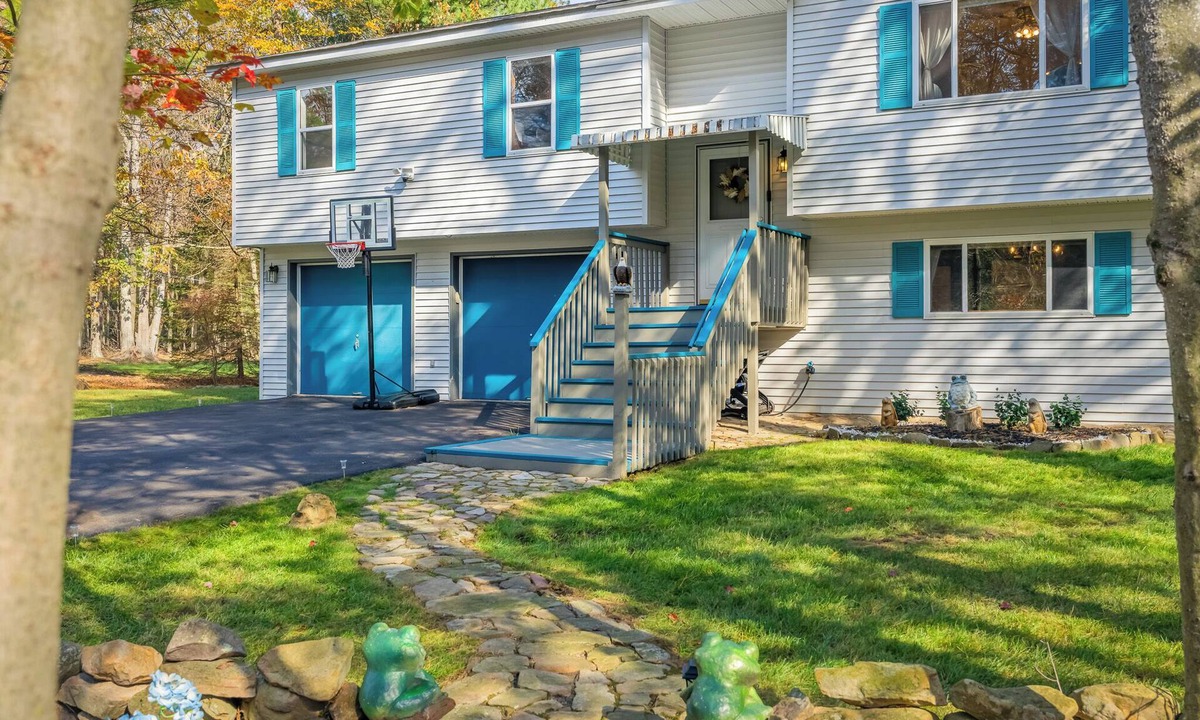 Pocono Summit House | The Leisure Nest Bird themed retreat w/hot tub, fire pit, gameroom, gym & more.