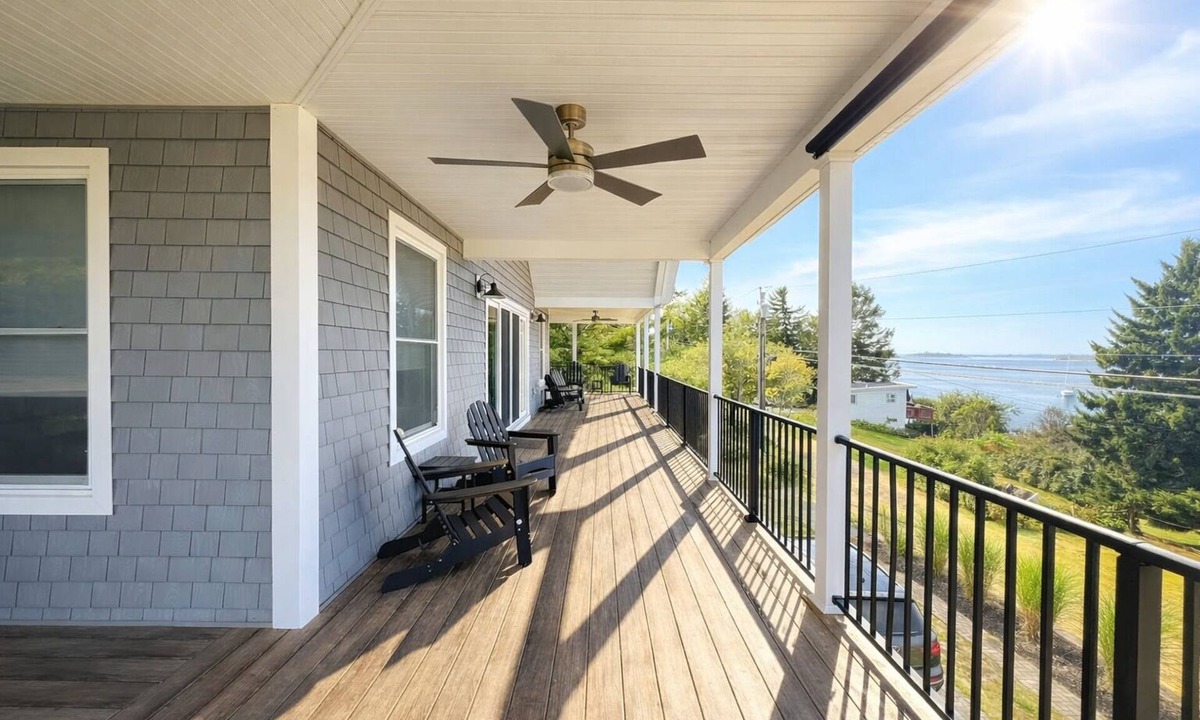 Mid-Coast and Islands House | This spacious home offers a FANTASTIC covered porch, perfect to spend your days gazing at the ocean!