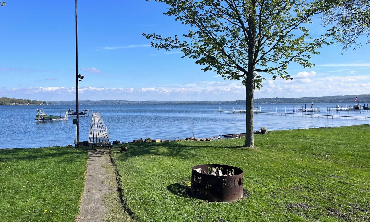 Bemus Point House | Unique Lakefront Property with dock slip and a trampoline for the kids