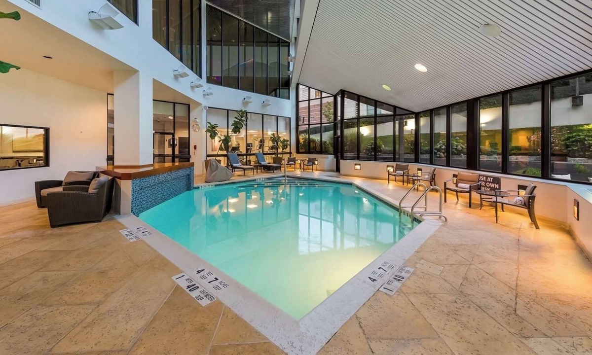 White Plains Hotel | Warm and Comfortable Pets Allowed Two Queen Room w/ Pool and Airport Shuttle