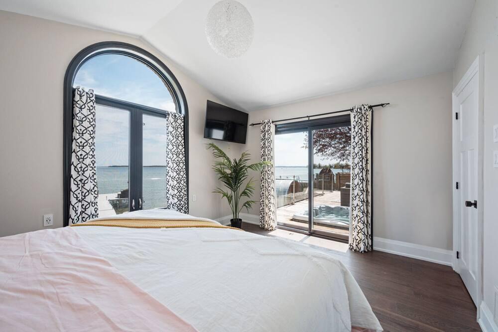 Alcona Cottage | Waterfront Wow with hot tub