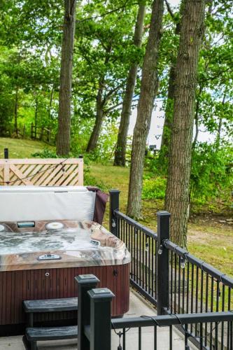 Geneva House | Waterside Leisure Lakefront Hot Tub & Game Room