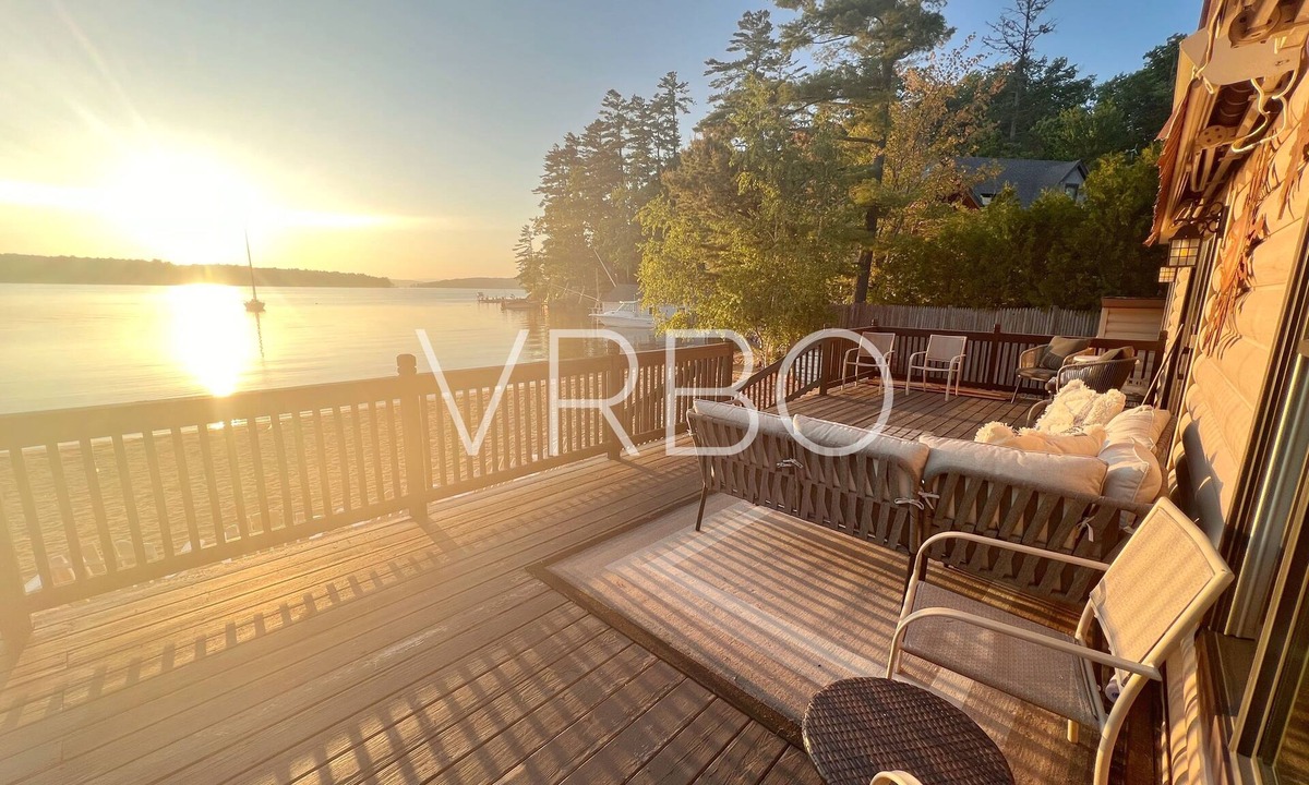 Gilford House | Winnipesaukee Beach house sits on 100’ of frontage and includes a dock slip