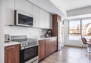 Ample Central Square 1BR w/Gym, Doorman, Roof Deck in Cambridge