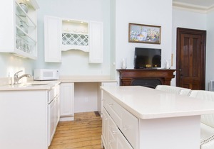Charming apartment with 12 foot ceilings, fireplaces, and lots of sunshine.