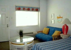 Professionally decorated with in ground pool. 1 1/2 blocks to the beach, boardwalk and shopping. Assigned off street parking!