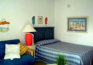 Professionally decorated with in ground pool. 1 1/2 blocks to the beach, boardwalk and shopping. Assigned off street parking!
