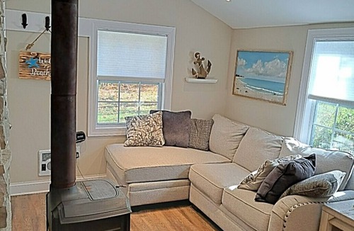 Novelty Apartment | 1 bedroom apartment with wood burning stove and paver patio, en suite laundry