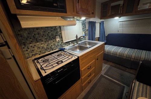Niantic RV Rental | 1-bedroom camper, with kitchen and dining room in amazing Rockyneck getaway!