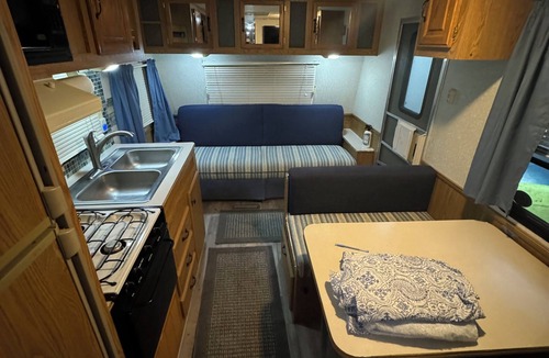 Niantic RV Rental | 1-bedroom camper, with kitchen and dining room in amazing Rockyneck getaway!