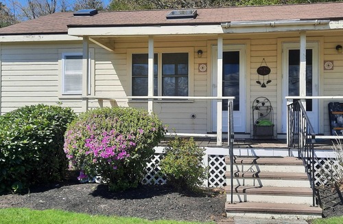 Gilford Condo | 2 BR + Loft Gilford Cottage on Winnipesaukee w/Deep Water Boat Slip & Beach.