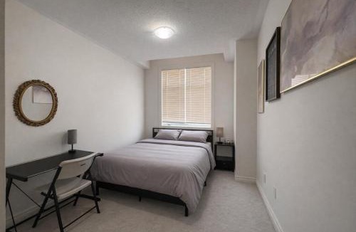 Cambridge House | 2024 Built 3-Bedroom Cambridge Townhome with Free Parking, WiFi, Full Kitchen, Laundry & Foosball - 8 Mins to African Lion Safari - Great for Families, Groups & Work Stays!