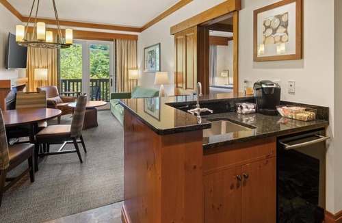 Stowe Area Condo | 2BR Spruce Peak condo with mountain views, fireplace, pool & hot tub