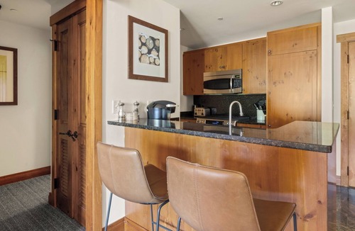 Stowe Area Condo | 2BR Spruce Peak condo with mountain views, fireplace, pool & hot tub