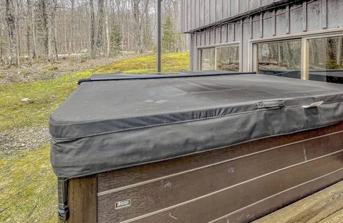 Ludlow House | 3-story dog-friendly home with private hot tub, firepit, grill, EVC