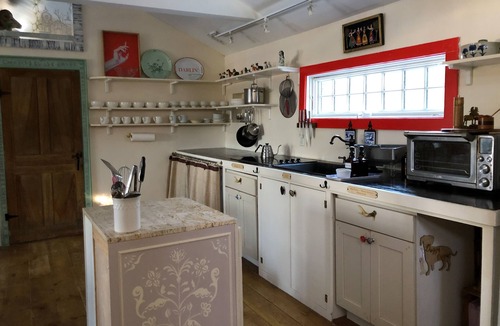 Rumford Center Cottage | Alpine Sanctuary ~ The Great Northern Tea Haus ~ European flair, woodland locale