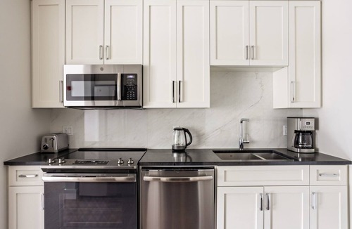 Prospect Hill Apartment | Amazing Somerville 1BR w/Gym & W/D, near Green Line, by Blueground