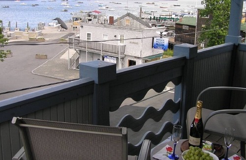 Bar Harbor Apartment | Bar Harbor downtown suite features covered deck with waterview