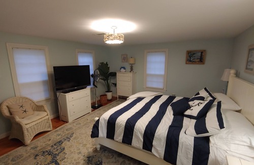 North Chatham House | Beachfront Cape w/ Dock Hot Tub Fire Pit Outdoor Kitchen Boats Kayaks - Pets Ok!