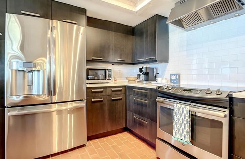 Sea Dunes Apartment | Beachfront Deck with steps down to the white sandy beach Sea Dunes Sandcastle 1A