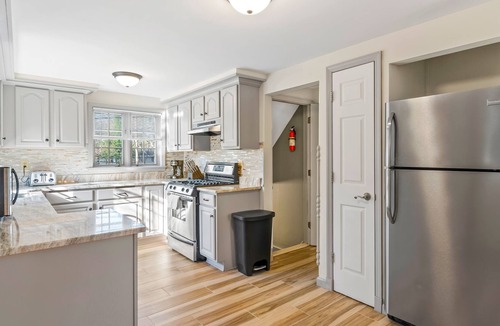 Queensbury House | Beautiful 3-story home with private pool, deck, grill, fireplace, game room, W/D