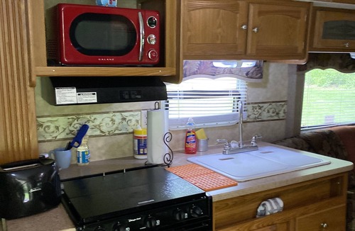 Dewittville House | Beautiful Camper on a country road.